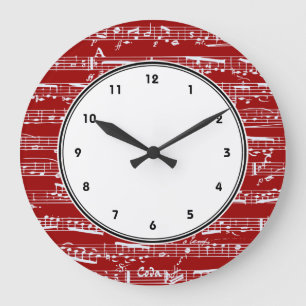 Horloge murale rouge de notes musicales avec des
