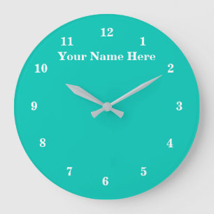 Horloge murale turquoise avec texte et couleurs pe