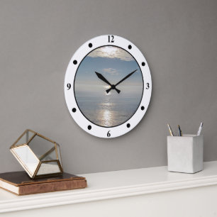 Horloge - Reflets du soleil sur l'océan