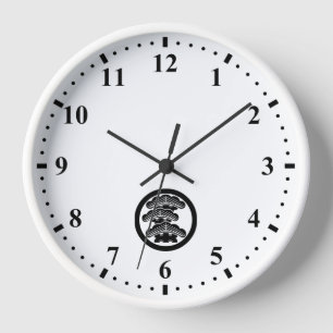 Horloge rond avec pin gauche à trois niveaux