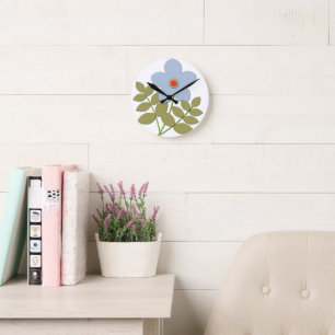 Horloge Ronde С simple fleur bleue