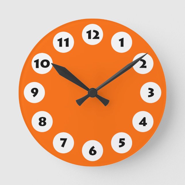 Horloge Ronde 12 Spots - Noir avec blanc sur orange (Recto)