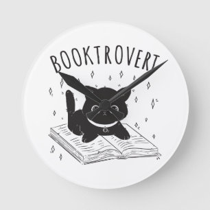 Horloge Ronde Booktrovert chat avec livre et étoiles