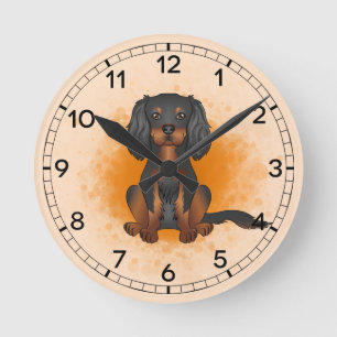 Horloge Ronde Cavalier King Charles noir et feu sur fond orange