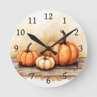 Horloge Ronde Citrouilles d'automne sur une table en bois