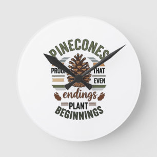 Horloge Ronde Conception de cône de pin - La promesse À feuillag