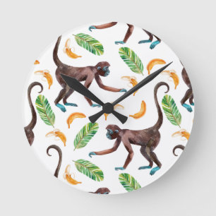 Horloge Ronde De doux singes qui jonglent avec des bananes