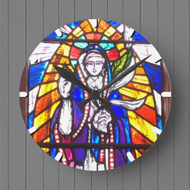 Horloge Ronde Design en verre tendu avec la figure religieuse. (Créateur téléchargé)
