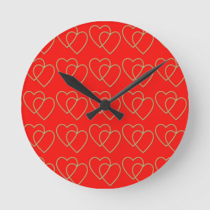 Horloge Ronde Deux coeurs d'amour d'or motif