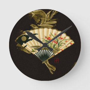 Horloge Ronde Fan orientale sertie par replis avec la conception