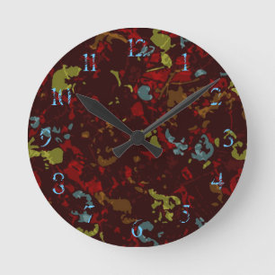 Horloge Ronde Feuille et fleurs colorés contre le camouflage