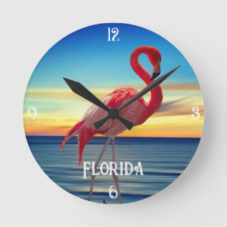 Horloge Ronde Flamant rose rose et coucher de soleil