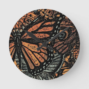 Horloge Ronde Imaginaire papillon orange art abstrait