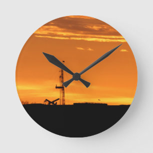 Horloge Ronde Installation de Workover au coucher du soleil