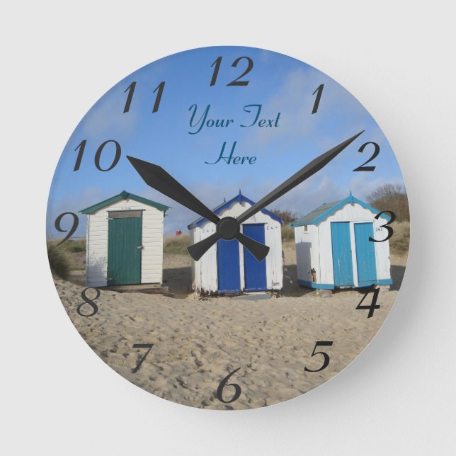 Horloge Ronde ish seaside blue skies and beach huach (Recto)