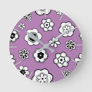 Horloge Ronde Jardin aux fleurs dans l'orchidée sauvage