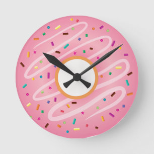 Horloge Ronde Le beignet rose avec l'arc-en-ciel arrose