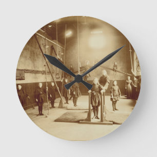 Horloge Ronde Le gymnase de la fille à l'établissement sourd e