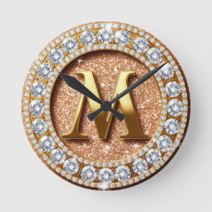 Horloge Ronde Lettre M en monogramme sur fond pailleté or rose