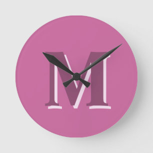 Horloge Ronde monogramme rose vif,
