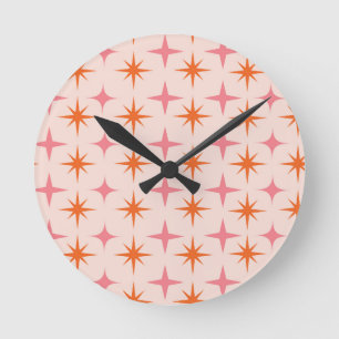 Horloge Ronde Motif étoilé rétro du milieu du siècle rose orange