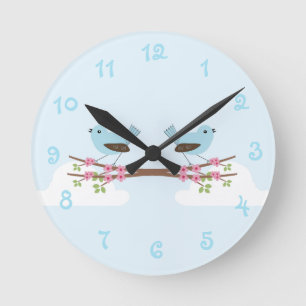 Horloge Ronde Oiseau bleu dans l'arbre en fleurs