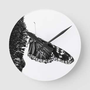 Horloge Ronde papillon timide blacq