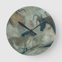 Peinture rocheuse montrant un cheval et une vache,