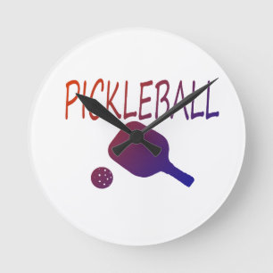 Horloge Ronde pickleball avec pagaie et boule orange à violet
