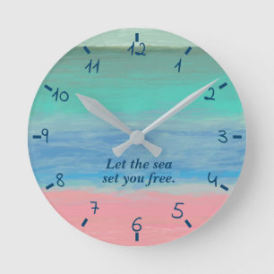 Horloge Ronde Plage de bord de la mer avec le sable rose