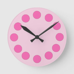 Horloge Ronde Points roses colorés sur la couleur faite sur