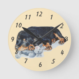 Horloge Ronde puppy cuddling teddy bear rottweiler