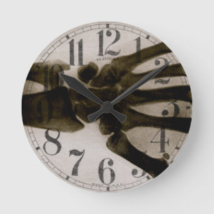 Horloge Ronde Radiographie de main humaine en noir et blanc vint