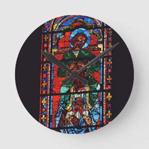 Horloge Ronde St John l'évangéliste montant les épaules d'Ez
