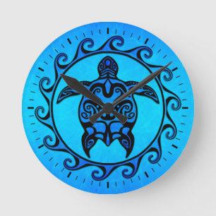 Horloge Ronde Tortue tribale bleue Sun