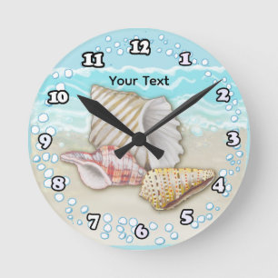 Horloge Ronde Trois Coquillages de Plage