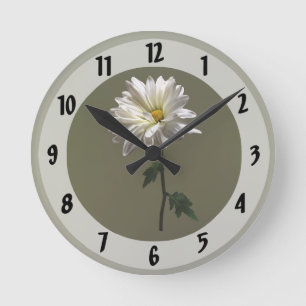 Horloge Ronde Une marguerite blanche