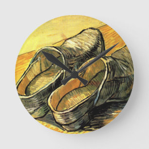 Horloge Ronde Une paire de cloches en cuir par Vincent van Gogh