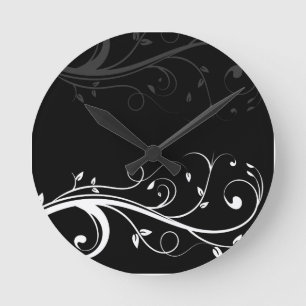 Horloges murales florales noires et blanches