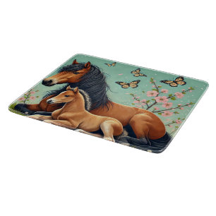 Horse and Foal Resting in a Spring Setting Cutting Board