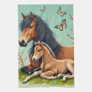 Horse and Foal Resting in a Spring Setting  Kitchen Towel