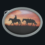 Horse, Rider and Pack Horse Belt Buckle<br><div class="desc">A horse and rider leading a pack horse during sunset decorates this attractive belt buckle</div>