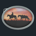 Horse, Rider and Pack Horse Belt Buckle<br><div class="desc">A horse and rider leading a pack horse during sunset decorates this attractive belt buckle</div>