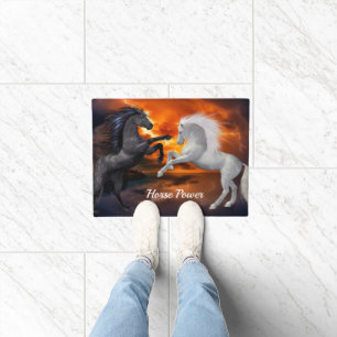 Horses fighting in a bad lightning storm doormat