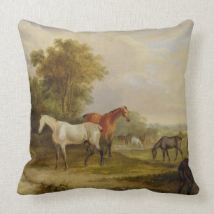 Horses Grazing: A Grey Stallion grazing with Mares Throw Pillow