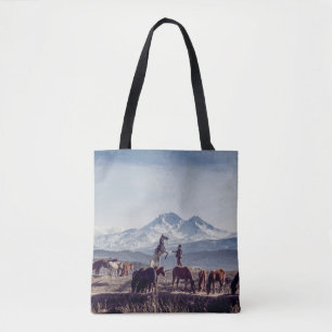 HORSES IN BROWN OPEN FIELD VIEWING MOUNTAIN AT DAY TOTE BAG
