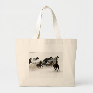 Horses in the snow large tote bag