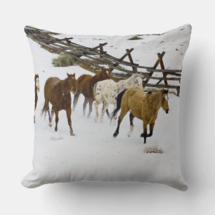 Horses Running in Snow Throw Pillow