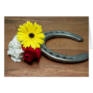 Horseshoe on Wood with Three Flowers of the Triple