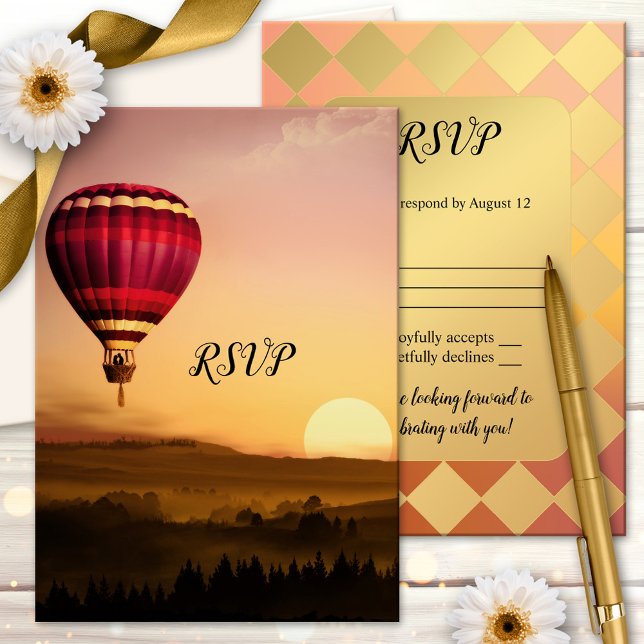 Hot Air Balloon Sunset Wedding RSVP Card (RSVP card featuring a hot air balloon with a couple silhouette over a dreamy landscape at sunset)
